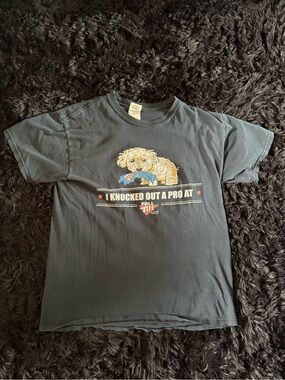 Full Tilt Black Dog Graphic Tee with 'I Knocked Out A Pro' Slogan